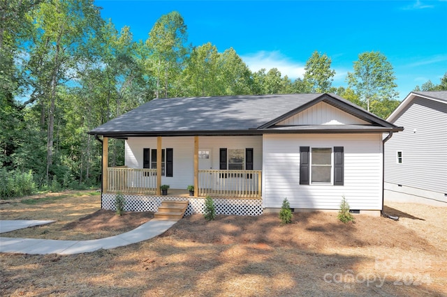 single story home featuring a porch