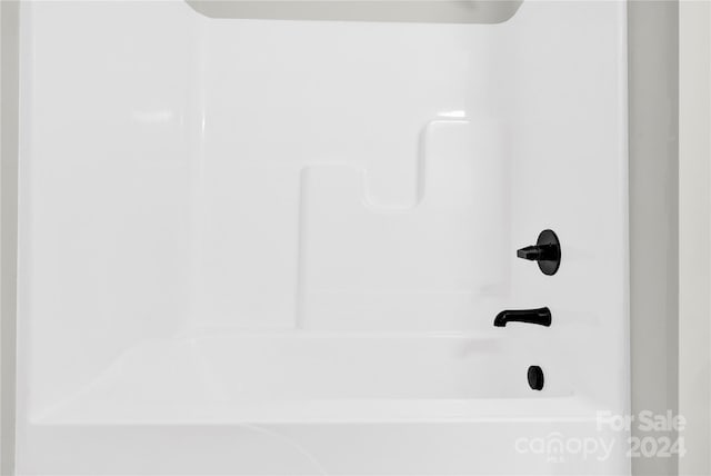 interior details featuring  shower combination