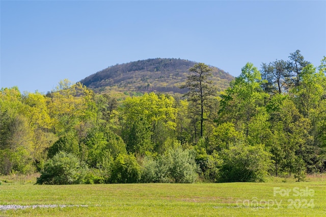 property view of mountains featuring a rural view