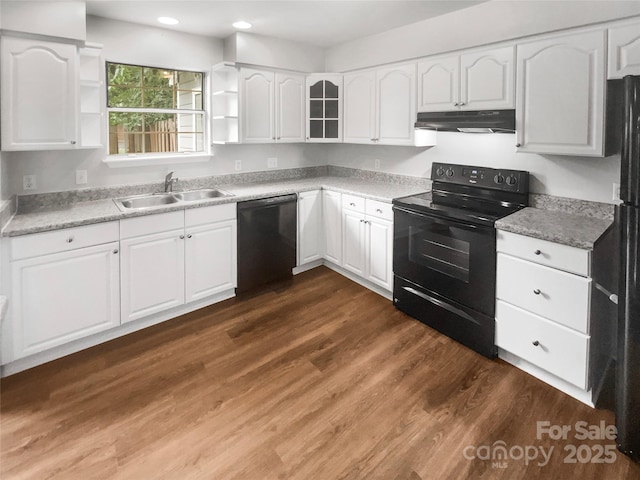 6003 Heath Valley Rd, Charlotte, NC 28210 - kitchen featuring black appliances, under cabinet range hood, a sink, open shelves, and white cabinets
