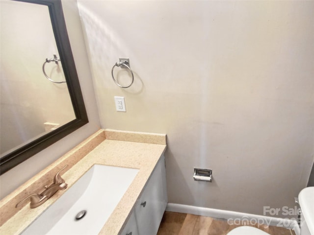 6003 Heath Valley Rd, Charlotte, NC 28210 - bathroom featuring vanity, baseboards, and toilet