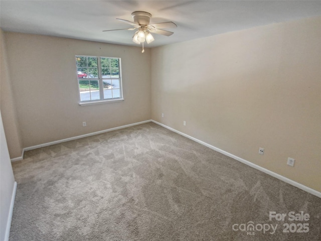 6003 Heath Valley Rd, Charlotte, NC 28210 - empty room featuring ceiling fan, carpet flooring, and baseboards