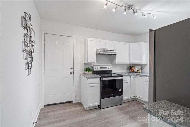 kitchen with stainless steel appliances, white cabinetry, and under cabinet range hood