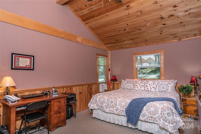 carpeted bedroom with lofted ceiling with beams, wooden walls, and wood ceiling