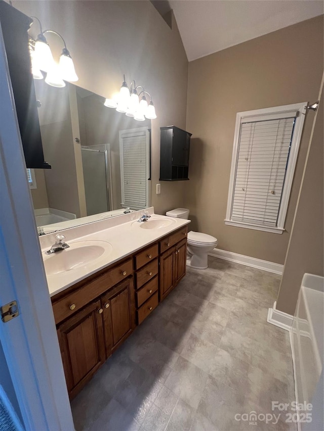 full bathroom featuring vanity, independent shower and bath, and toilet