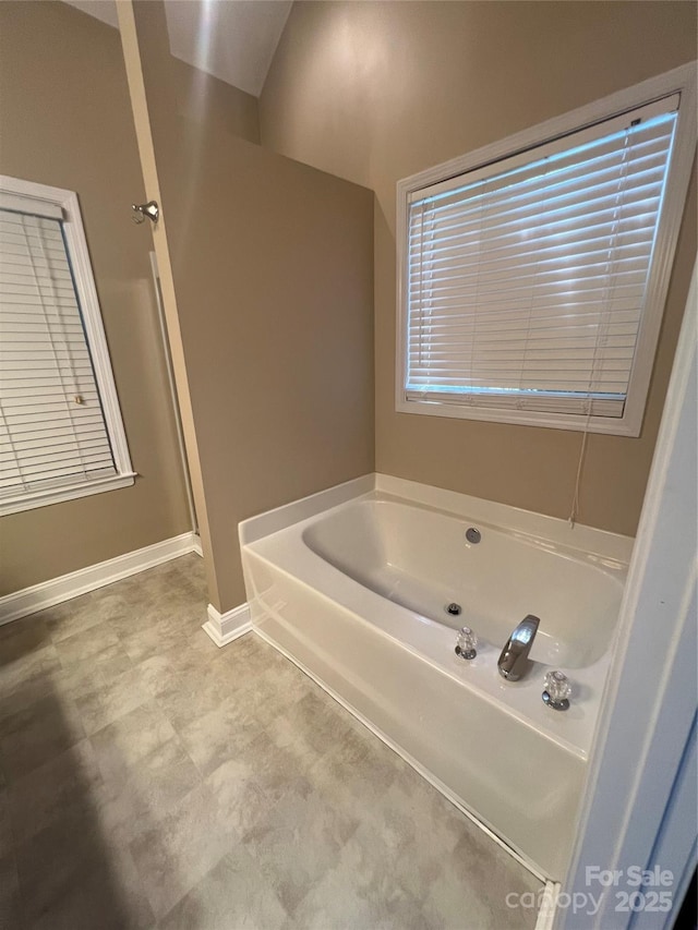 bathroom with a washtub