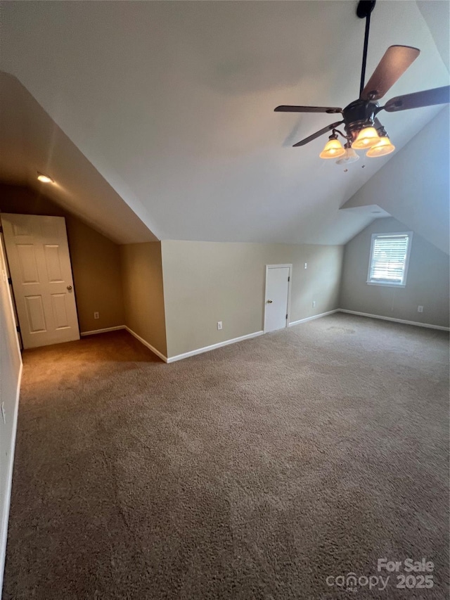 bonus room featuring carpet floors, ceiling fan, and vaulted ceiling