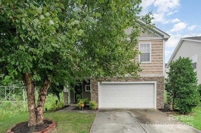 obstructed view of property with a garage