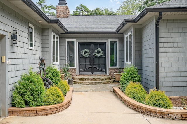 doorway to property with a patio