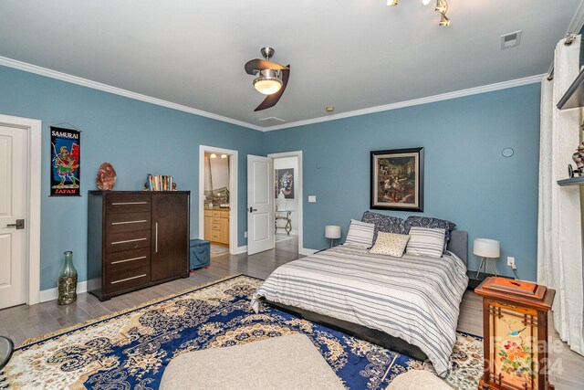 bedroom with ensuite bathroom, crown molding, hardwood / wood-style floors, and ceiling fan