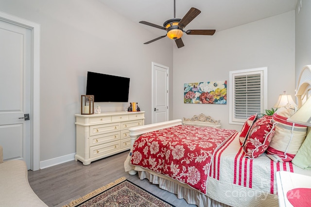 bedroom with hardwood / wood-style flooring and ceiling fan