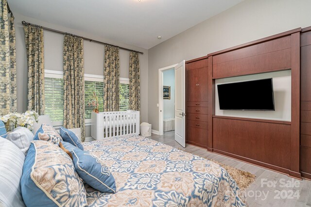 bedroom with light wood-type flooring