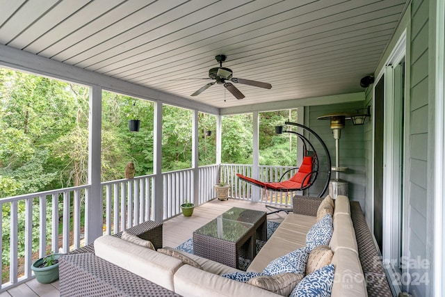 exterior space featuring ceiling fan