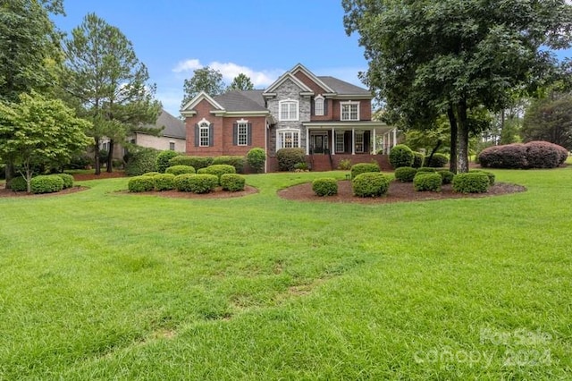 view of front of home with a front yard