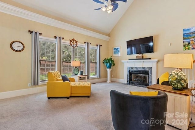 living room featuring carpet floors, a premium fireplace, ceiling fan, and high vaulted ceiling