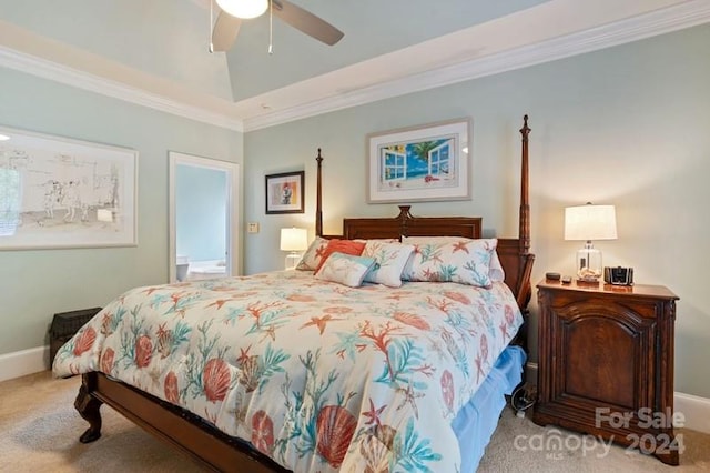 carpeted bedroom featuring ceiling fan and crown molding