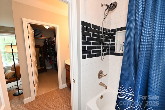 bathroom with vanity and shower / tub combo with curtain