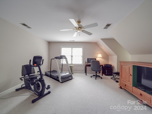 workout area featuring light carpet, lofted ceiling, and ceiling fan