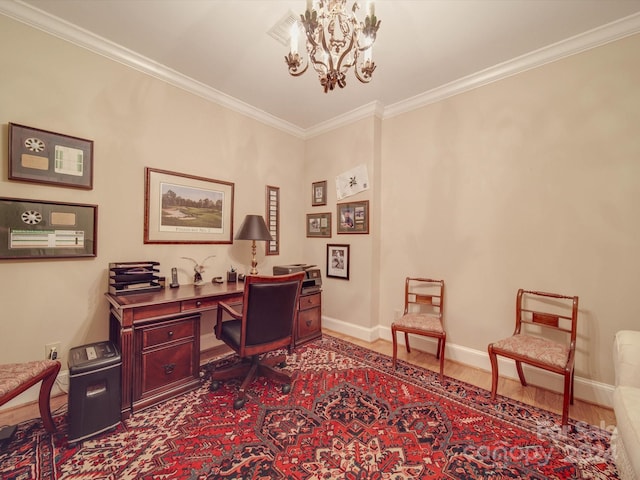 home office featuring ornamental molding, hardwood / wood-style flooring, and a chandelier