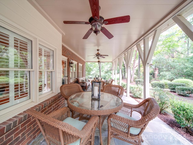 view of patio featuring ceiling fan