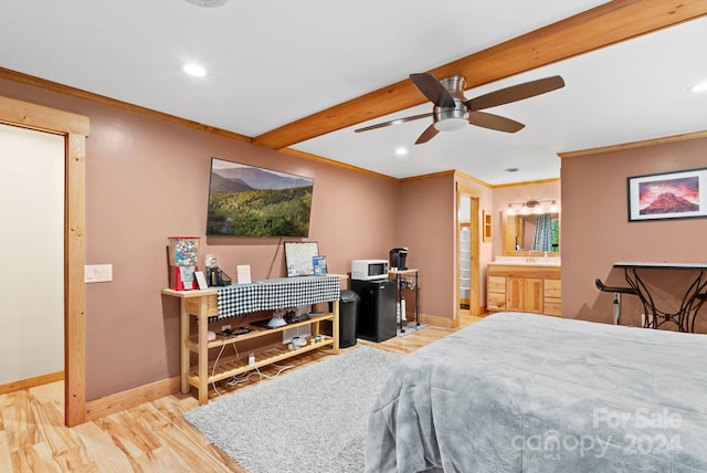 bedroom featuring baseboards, beamed ceiling, wood finished floors, and crown molding