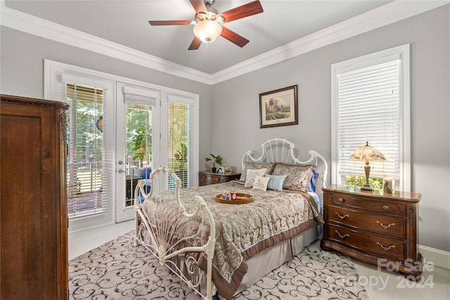 tiled bedroom with ornamental molding, french doors, ceiling fan, and access to exterior