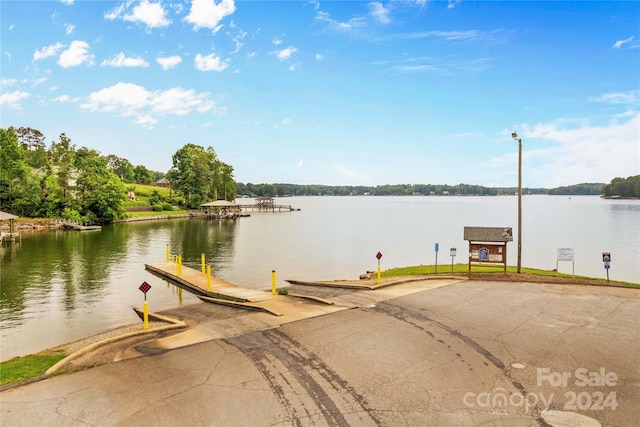 dock area featuring a water view