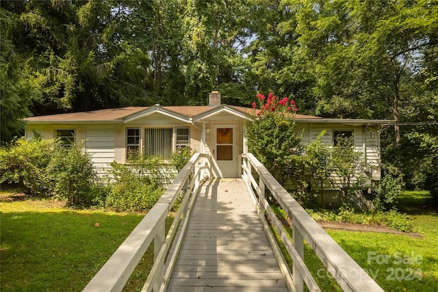 ranch-style house with a front yard