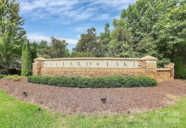 view of community sign