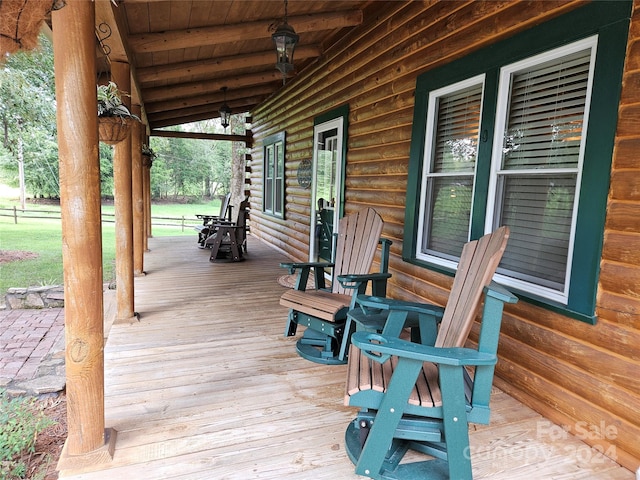 wooden terrace with covered porch