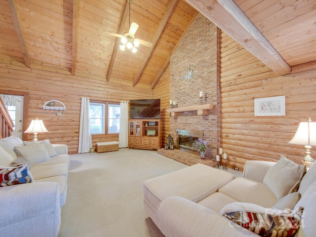 living room featuring beam ceiling, wood ceiling, high vaulted ceiling, a fireplace, and carpet