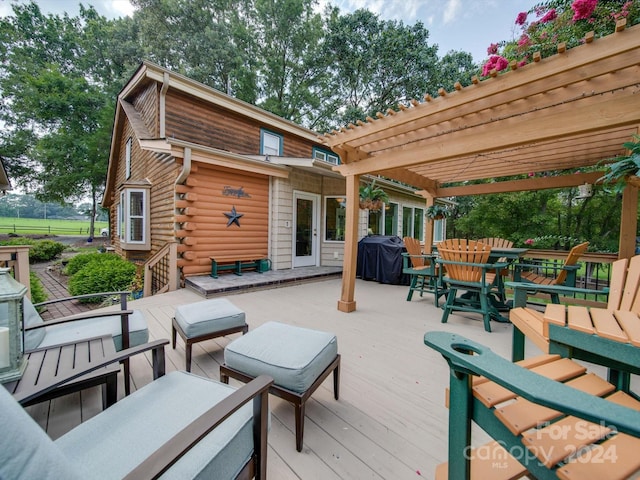 deck featuring area for grilling, an outdoor living space, and a pergola