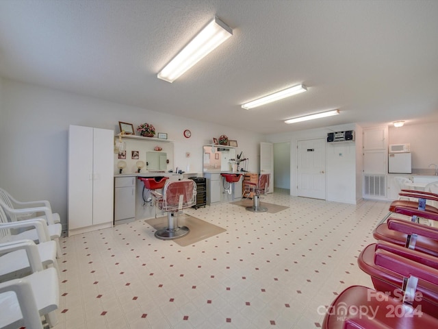 interior space with a textured ceiling