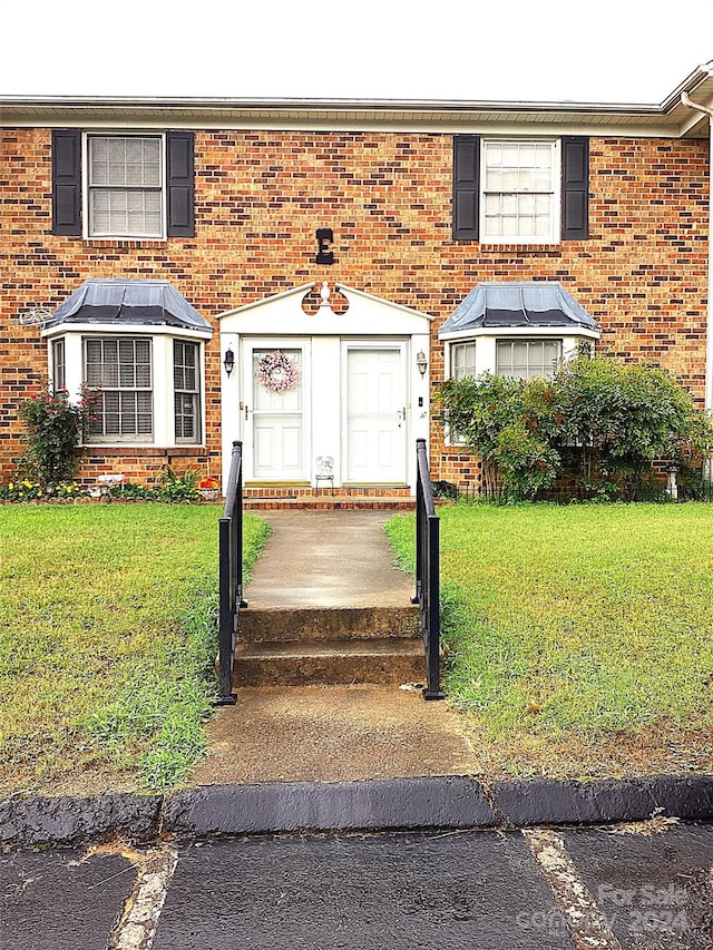 exterior space with a front yard