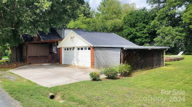 garage with a yard