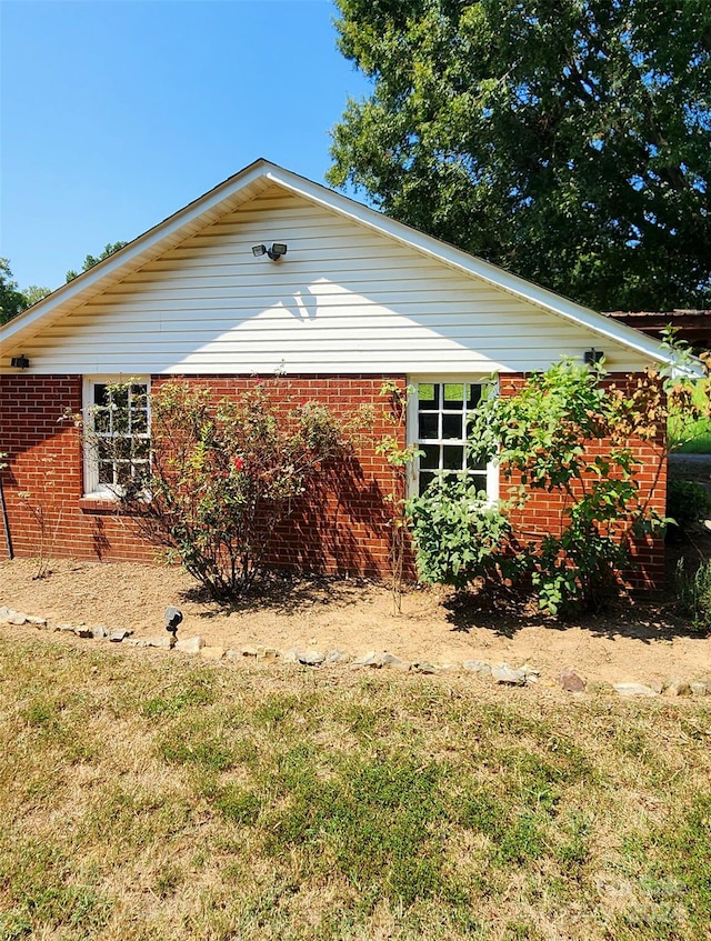 exterior space with a front yard