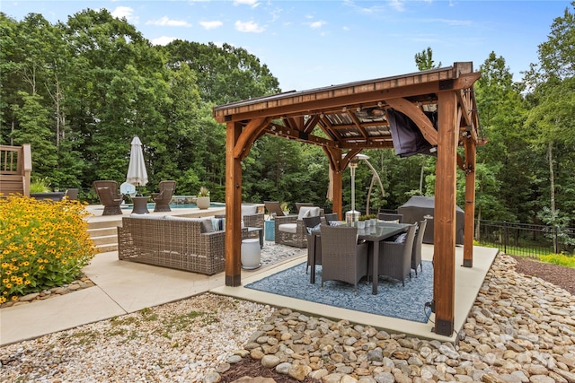 view of community featuring a patio and a gazebo