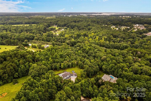 127 Tradition Ln, Mooresville, NC 28115 - drone / aerial view featuring a view of trees