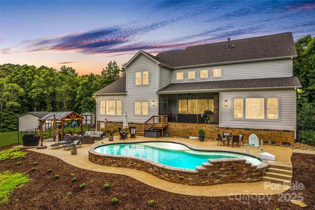 127 Tradition Ln, Mooresville, NC 28115 - back of property with fence, a gazebo, outdoor lounge area, a fenced in pool, and a patio