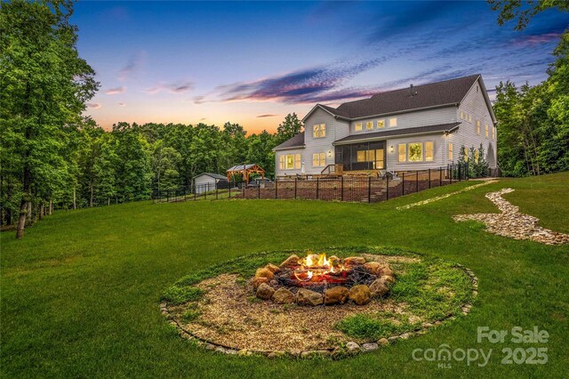 127 Tradition Ln, Mooresville, NC 28115 - view of yard featuring fence and a fire pit