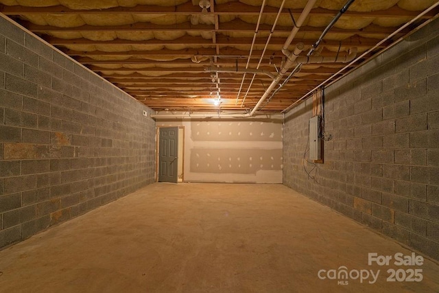 unfinished basement with electric panel