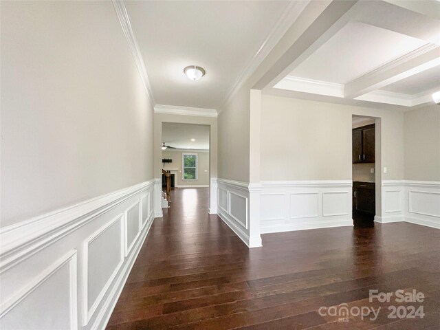 hall featuring hardwood / wood-style flooring and crown molding