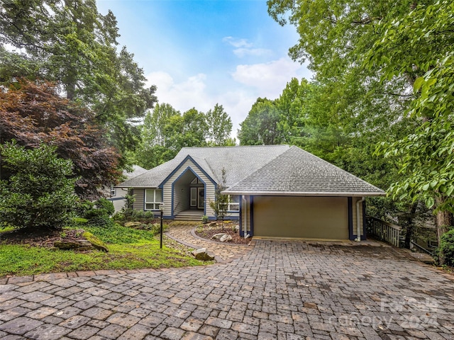 single story home with a garage