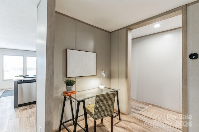 office space with light hardwood / wood-style flooring