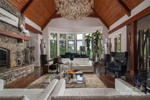 living room featuring dark hardwood / wood-style flooring, a fireplace, and beamed ceiling