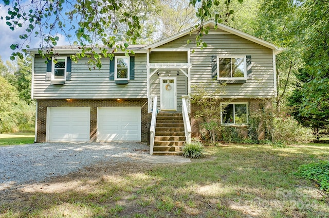 raised ranch featuring a garage