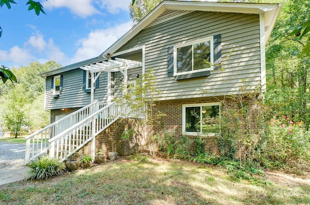 view of front of house with a pergola