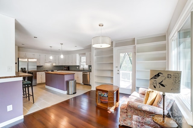 living room with light hardwood / wood-style flooring