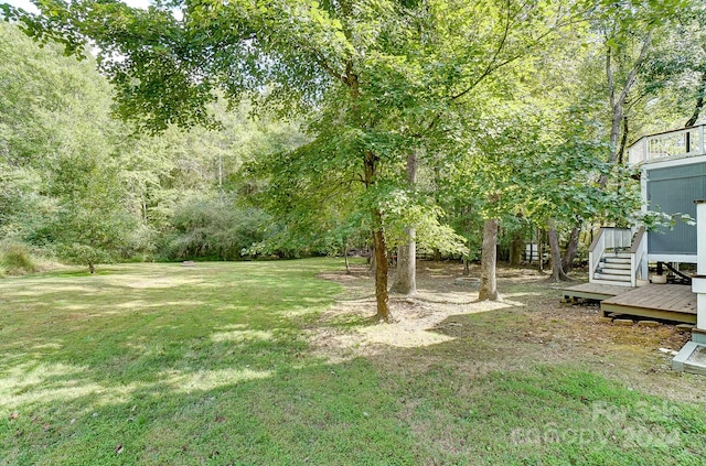 view of yard with a deck