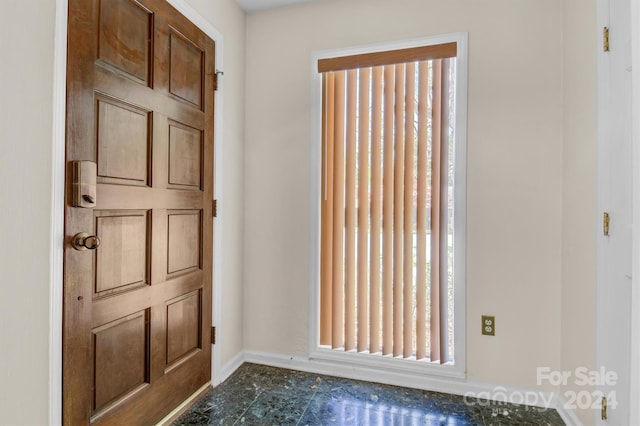 foyer with baseboards